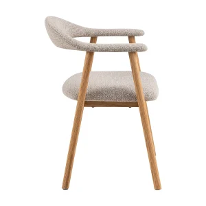 Aiden eetkamerstoel met armleuning bouclé beige. Aiden eetkamerstoel met armleuning bouclé beige.