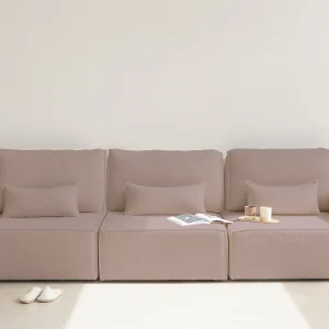 4-zitsbank met chaise longue, bekleed met bouclé en grenenhout in lichtroze 4-zitsbank met chaise longue, bekleed met bouclé en grenenhout in lichtroze