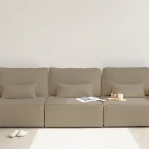 4-zitsbank met chaise longue, bekleed met bouclé en grenenhout in steen 4-zitsbank met chaise longue, bekleed met bouclé en grenenhout in steen